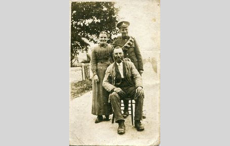 Caroline & William West with son Jessie outside home in the Fridays WW1
